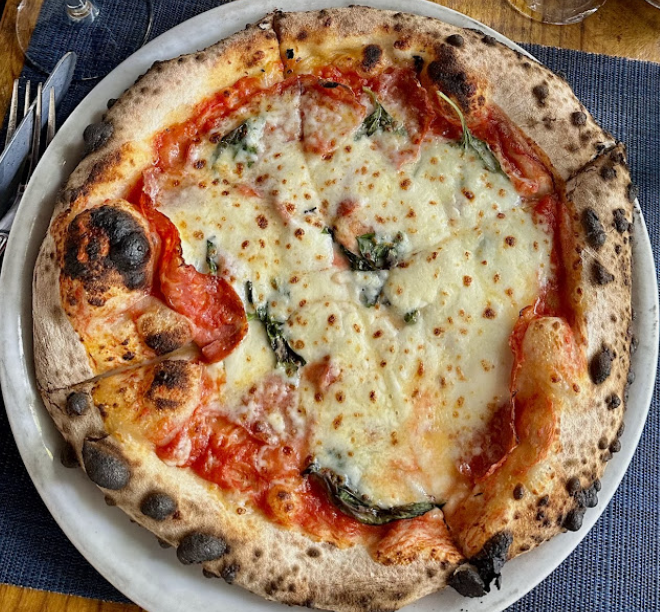 Onlywood Pizzeria Trattoria signature dishes Margherita PizzaWood-Fired Chicken WingsFettuccine Alla Bolognese